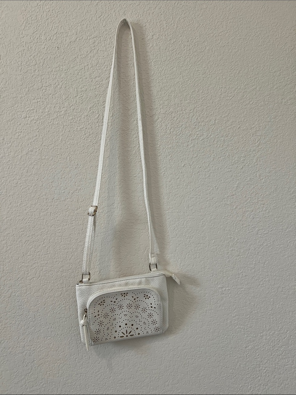 Claire's White Laser Cut Flower Crossbody Bag